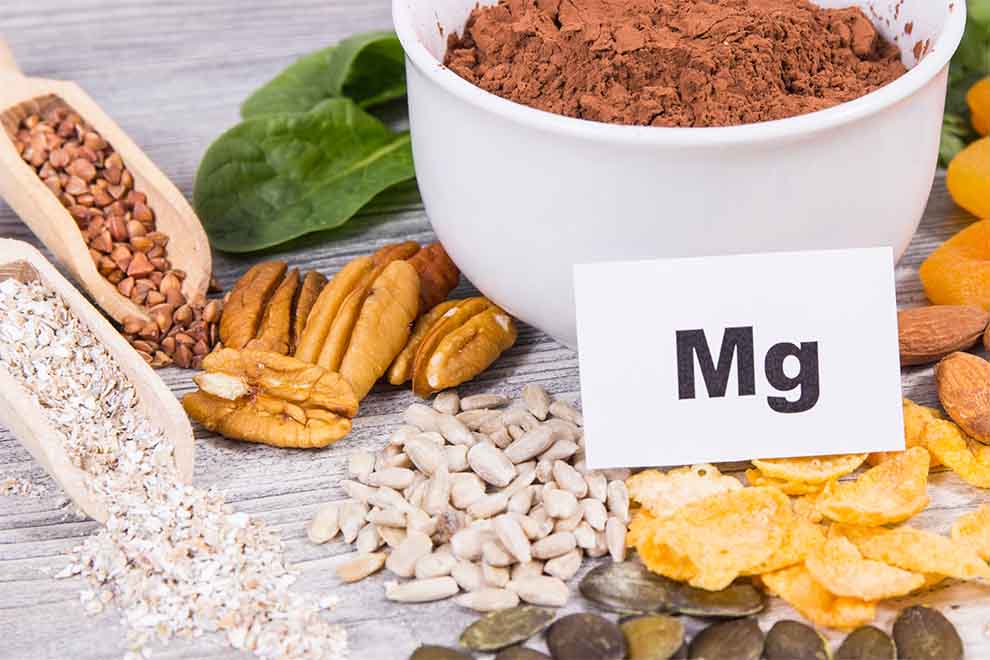 Alimento rico em magnésio com sementes e nozes.